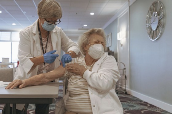 Senior receiving COVID vaccine 2020