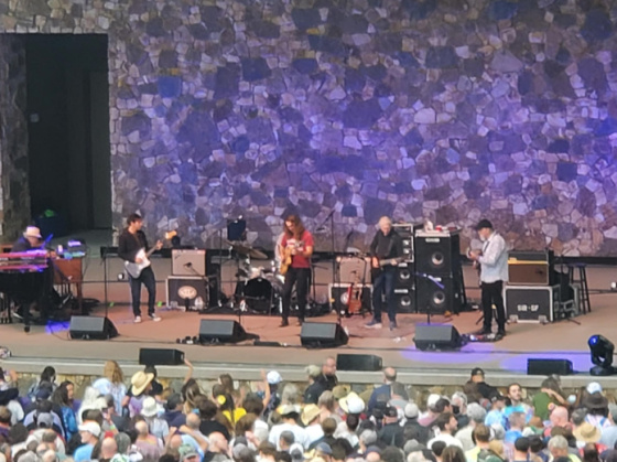 Grahame is in the middle in the red shirt and Phil is next to him, second from the right.