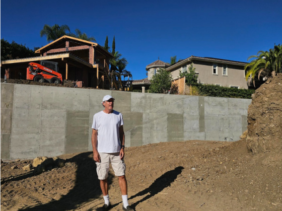 Tennis Court retaining wall with the casita and viewing deck Tennis Paradise