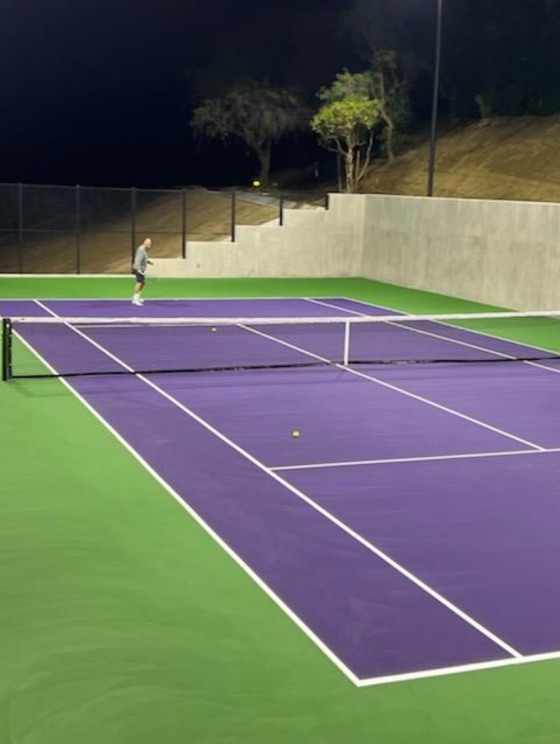 Gary on the Eleven tennis court
