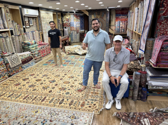 Gary Carmell buying rugs in Oman