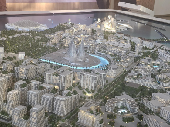 model of the development with The Louvre and Guggenheim