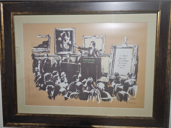 Banksy’s piece titled “Morons (White)